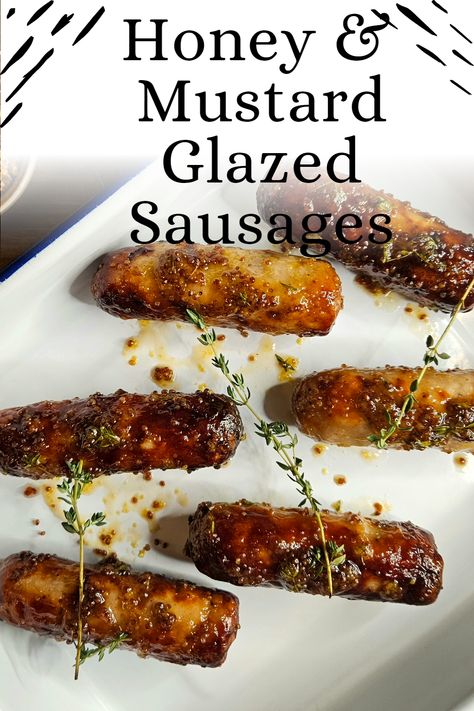 Honey, mustard, & pork are combined so often that it could be considered a holy trinity. These honey & mustard glazed sausages prove it. There’s no reason you couldn’t substitute the pork sausages for a beef, chicken sausage, or any other sausage you like, even a veggie sausage. However, pork’s fat content makes it the ideal meat for a sausage, which the other alternatives fail to replicate. Honey Glazed Sausages, Honey Mustard Sausages, Glazed Sausages, Easy Canapes, Cumberland Sausage, White Sausage, Pork Sausages, Honey Mustard Glaze, Cocktail Sausages