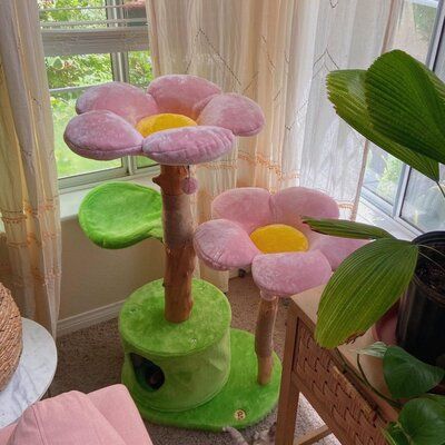 Want a unique cat tree that beautifies your home while giving your cat a place to rest? This stunning, lifelike Cherry Blossom Cat Tree is the one you are looking for. Inspired by the natural beauty of the Cherry Blossom Tree, this modern floral design is hand-made with real natural, treated wood branches, two cozy cherry blossom-designed flower cat beds, and one leaf design perch. It has an enclosed, private condo on the ground floor and two dangly pom-pom toys attached for playtime fun. ***All Flower Cat Tree, Katt Hus, Katt Grejer, Cat Tree House, Flower Cat, Modern Floral Design, Wood Branch, Floral Cat, Cat Condo