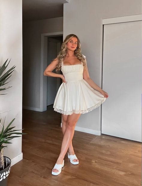 Blonde girl posing in houseofcb white dress. Fit and flare style while wearing plastic jelly white sandals Houseofcb Dresses, White Dress Outfit, Corset Back, House Of Cb, White Sandals, Most Favorite, Jeffrey Campbell, No Frills, Shop House