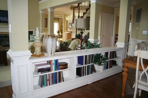 NB:  a nice example of a book shelf/half wall between pillars. Half Wall Room Divider, Half Wall Ideas, Sliding Room Dividers, Half Walls, Bookshelves In Living Room, Divider Wall, Walls Room, Room Remodeling, A Living Room