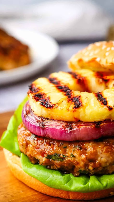 These juicy and flavorful ground chicken teriyaki burgers are doused in a sweet and savory teriyaki sauce and topped with grilled pineapple and sweet red onions. Chicken Pineapple Burgers, Teriyaki Chicken Burger With Pineapple, Teriyaki Chicken Burgers, Hawaiian Chicken Burgers Pineapple, Bbq Chicken Burgers Recipe, Teriyaki Chicken Burger, Hawaiian Chicken Burgers, Teriyaki Burgers With Grilled Pineapple, Easy Chicken Burgers