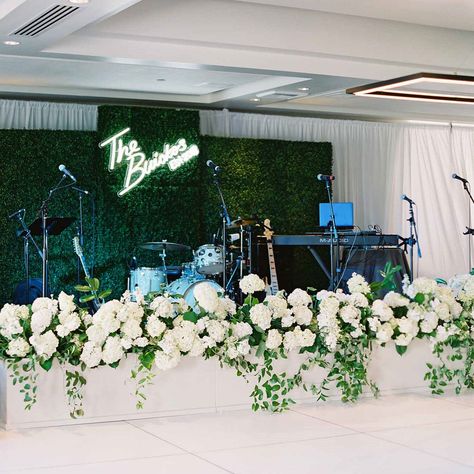 If you and your partner have decided that having a live band at your wedding is the best fit, you’re in for a real treat. Incorporating live music can immediately change the mood of your reception, bringing a new and exciting energy to the mix. But now that you’ve secured your musical performance for the big day and you've gone over the playlist, w... Tall Floral Arrangements, Wedding Reception Backdrop, Beachside Wedding, Dance Floor Wedding, Elegant Country, All White Wedding, Floral Event Design, Stage Set, Wedding Stage