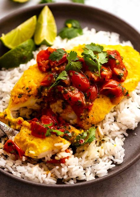 Golden Turmeric Fish (Indonesian) served on white rice, ready to be eaten Turmeric Fish, Turmeric Curry, Sambal Sauce, Fish Marinade, Baked Fish Fillet, Fish Recipes Baked, Recipetin Eats, Recipe Tin, Fresh Spices