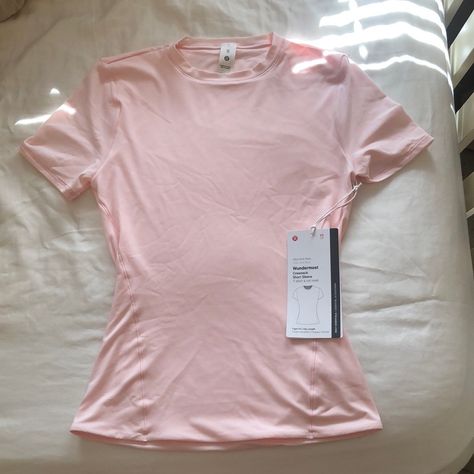 Lululemon Light Pink Wunderlust Crewneck Tee Shirt. Tight Fit. Never Worn And New With Tags. Size Xs (2-4) Tight Shirts For Women, Pink Crewneck Outfit, Pink Lululemon Shirt, Light Pink Clothes, Compressed Shirt, Light Pink Pfp, Pinterest Wishlist, Light Pink Lululemon, Lululemon Collection