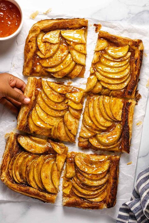 This Easy Puff Pastry Apple Tart is seasonal, simple, and scrumptious! Store-bought puff pastry crust makes this dessert quick, easy, and approachable for even the most novice of home cooks. And just look how gorgeous it is!?! Savoury Puff Pastry Tart, Best Apple Tart Recipe, Apple Crisp With Puff Pastry, Apple Tart Recipe Puff Pastry, Apple Galette With Puff Pastry, French Apple Tart Puff Pastry, Apple Phyllo Dough Recipes, Apple Pie Variations, Apple Puff Pastry Dessert