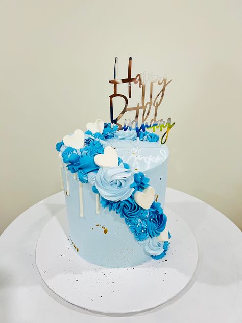 Get over the Monday Blues !!   
🌀😀 
...........
Flavor- 6" Tall Chocolate classic cake masked with Ice blue shade and decorated with two contrast Rosettes & few handmade white chocolate hearts 🤍 
🌀Silver Happy birthday topper & added gold paint splashes Ice Blue Birthday Cake, Birthday Party Ideas Blue And White, 18th Birthday Cake Blue And White, Tall Cake Decoration, Royal Blue And Silver Birthday Cake, Blue White Silver Cake, White Blue And Gold Cake, Blue Cake Ideas Birthday Simple, Blue And Silver Cake Ideas