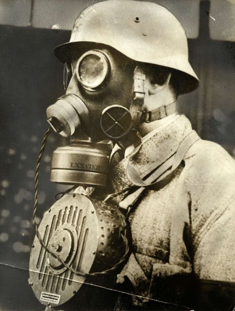 Using a gas mask in the old days made you into a mute. The German army thus came up with this contraption during WW2 to allow "communication" with others. The microphone is installed inside the mask and a substantial speaker is worn around the neck. The setup is cumbersome and heavy. It did not make it into line production. Gas Mask Art, Masks Art, German Army, Old Days, The Old Days, Gas Mask, Military Art, Dieselpunk, Pics Art