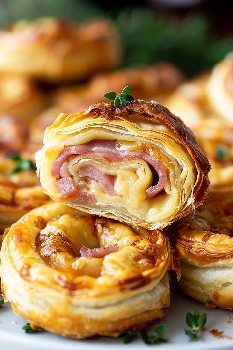 Ham and cheese pastry pinwheels Brunch Bites Ideas, Pastry Savory Recipes, Ham And Cheese Pinwheels Puff Pastry Easy, Christmas Ham Appetizers, Puffed Pastry Ham And Cheese, Puff Pastry With Ham And Cheese, Party Ham Rolls, Quick And Easy Pastry Recipes, Puff Pastry Pastries