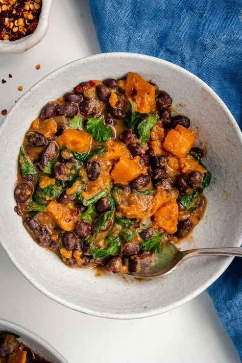 Full of plant-based protein and fiber, this black bean and sweet potato stew makes a delicious hearty meal. Enjoy this healthy one-pot meal that's rich, creamy and easy to make with simple pantry staples. High Fiber Dinner, Black Bean And Sweet Potato, Bean And Sweet Potato, Sweet Potato Stew, Black Bean Stew, Autumn Recipes Vegetarian, Healthy One Pot Meals, Lemon Garlic Salmon, Potato Stew