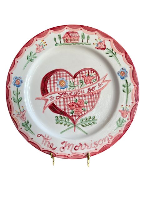 Self-taught artist Tricia Lowenfield crafts one-of-a-kind whimsical pieces that enliven any household and will become family treasures. Entirely handmade, the Love You So Platter can deliver a personalized Valentine's message to those you love. Makes a delightful gift, or the ideal platter from which to serve that special Valentine's Day Dinner. Yum! Product Details Handpainted ceramic. Handmade in the USA. Care Details Dishwasher safe. Hand wash recommended. Size & Fit 13" DIA Shipping Details Wedding Plates Diy, Whimsical Plates, Ceramic Store, Painted Ceramic Plates, Plates Diy, Valentines Day Dinner, Wedding Plates, Painted Plates, Ceramic Handmade