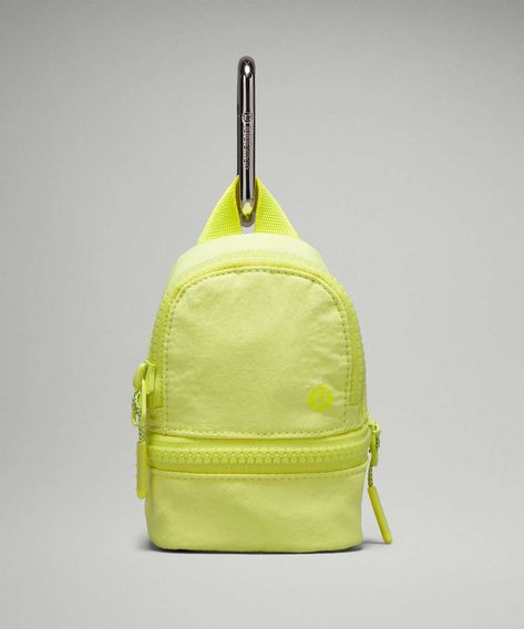 Lululemon City Adventurer Backpack *Nano - Electric Lemon - lulu fanatics Lululemon City Adventurer Backpack, Adventurer Backpack, Lululemon Branding, Lemon Color, Waist Purse, Lululemon Bags, Festival Bag, Convertible Bags, Water Repellent Fabric