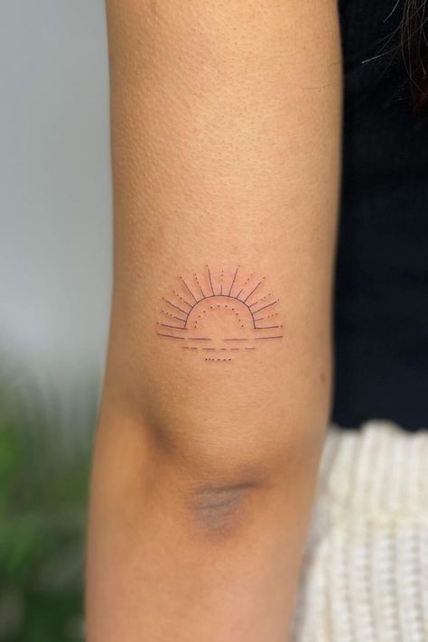 40 Brilliant Sun Tattoos For Women (2022 Guide) Sun Tattoo With Initials, Sun Compass Tattoo, Sun Tattoo Placement, The Sun Will Rise Tattoo, Sun Tattoos For Women, Tattoo Placement For Women, Rising Sun Tattoos, Above Elbow Tattoo, Sun Tattoo Designs