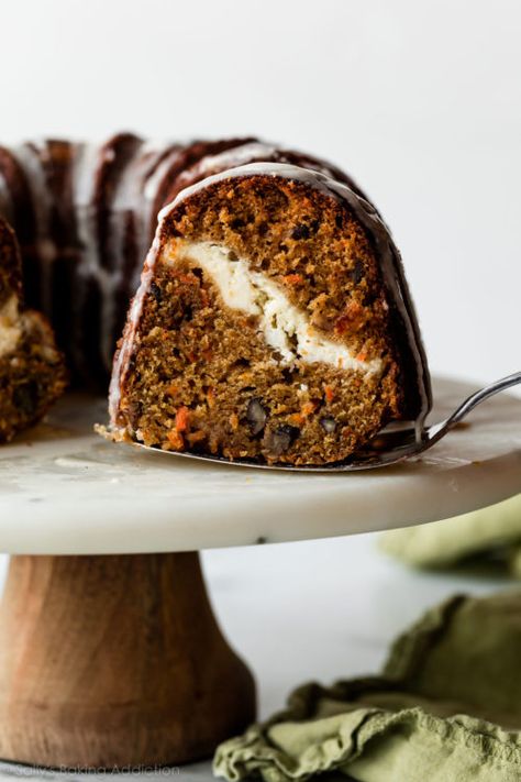 Cheesecake Swirl Carrot Bundt Cake | Sally's Baking Addiction | Bloglovin’ Carrot Cake Bundt, Bundt Cake Mix, Carrot Bundt Cake, Cake Bundt, Orange Icing, Pumpkin Bundt Cake, Sally's Baking, Gateaux Cake, Cheesecake Brownies