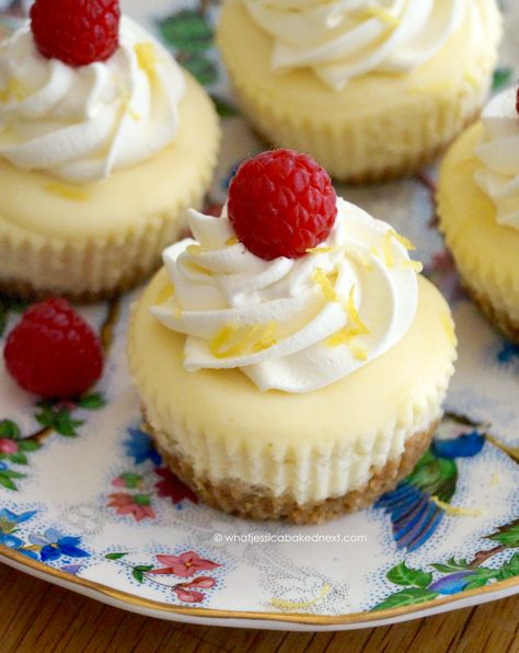 Mini lemon cheesecakes are the perfect treat paired with whipped cream, berries and homemade blueberry sauce!  These mini lemon baked cheesecakes a deliciously indulgent without being overly sweet.… Cheesecake Flavors Ideas, Cheesecake Flavors, Lemon Cheesecakes, Blueberry Sauce Recipe, Chocolate Chip Cake Recipe, Mini Lemon Cheesecakes, Chocolate Orange Cheesecake, Orange Cheesecake, Diy Dessert