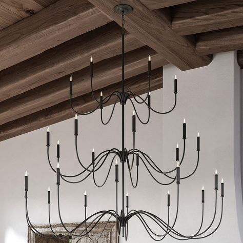 Simple, yet elegant, the Tirrell Chandelier from Currey & Company elevates your home with its subtle grace and charm. Its classic design features a central hub with six arms that beautifully arc upward, displaying candelabra-style bulbs. Opt for the double tier version for an even more dynamic design. The even and thoughtful illumination creates an inviting ambiance in any space. Highlights Height-adjustable to suit your space Dimmable to set the mood in any space Available in Antique Black finish in three combinations Currey & Company Tirrell Chandelier in Black Large Black Light Fixture, Grand Entry Chandelier, Large Black Chandelier High Ceilings, Extra Large Chandelier, Great Room Chandelier Vaulted Ceiling, Entry Way Chandelier Ideas, Tall Foyer Lighting, Vaulted Ceiling Chandelier, 2 Story Foyer Chandelier