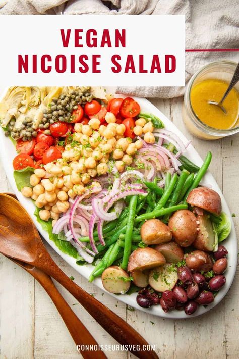 This vegan spin on the classic Nicoise salad is made with fresh greens, baby potatoes, green beans, juicy cherry tomatoes, artichoke hearts, chickpeas, and olives in a zesty Dijon vinaigrette! It's hearty, delicious, and perfect for a light lunch or a starter for special dinners. Vegan Nicoise Salad, Potatoes Green Beans, Tuna And Egg, Dijon Vinaigrette, Hearty Lunch, Vegan Chickpea, Nicoise Salad, Red Onion Salad, Cooking Courses