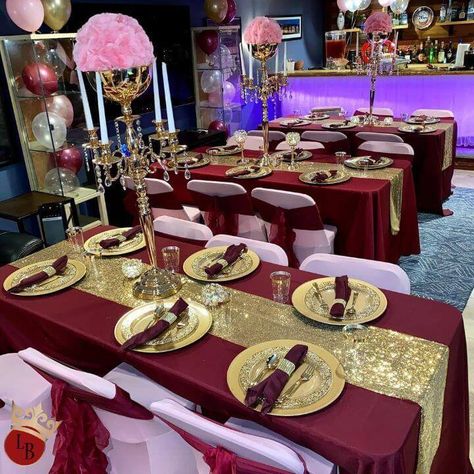 Glam up your lovely burgundy & pink themed baby shower setup by dressing up your tables with burgundy tablecloths and gold sequin runners. Wow your guests with a chic place setting using gold chargers and burgundy napkins tied with gold rings. Opt for crystal beaded candle holders and place flower balls over gold candelabras for a mesmeric tabletop decor. Also, bedeck your chairs with pink chair covers and burgundy sashes as well as include pretty balloons in your setup for a glorious display. Pink Chair Covers, Gold Chair Covers, Burgundy Napkins, Burgundy Baby Shower, Pink And Burgundy Wedding, Gold And Burgundy Wedding, Burgundy Wedding Theme, Beaded Candle Holders, Event Decor Ideas