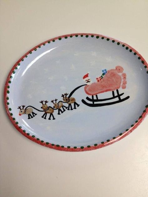 Christmas Handprint Pottery Ideas, Infant Keepsake Ideas, Grandparent Pottery Ideas, Baby Handprint Pottery Ideas, Handmade Christmas Gifts From Baby, Baby Ceramic Painting Ideas, Christmas Plates Diy Kids Handprint, Baby Christmas Pottery Ideas, Christmas Plates Diy Kids