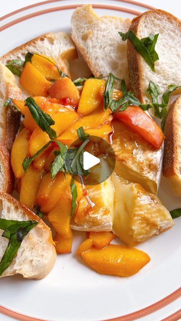 Marissa Mullen on Instagram: "GRILLED BRIE WITH HOT HONEY PEACHES 🍑 Truly one of my favorite summer dishes. The peaches add the perfect sweet and acidic stonefruit pairing note to the creamy brie, while the spicy honey brings a slow heat.

RECIPE
1 wheel of brie 
1 ripe peach 
2 tbsp spicy honey
1 French baguette, sliced 
1 tbsp fresh basil 
Flaky salt to garnish 
Olive oil to brush on the brie 

1) Heat your grill (or grill pan, which is what I used) to medium high heat 
2) Brush both sides of the brie with olive oil
3) Grill on one side until grill marks form, about 5 minutes 
4) Flip and repeat on the other side, cook until the cheese is soft and squishy to touch. Let sit for 5
minutes 
5) In a small pan over medium heat, sauté sliced peaches with hot honey until soft, about 5-7 minute Grilled Brie With Peaches, Grilled Brie, Sliced Peaches, French Baguette, Easy Appetizers, Flaky Salt, Spicy Honey, Food Appetizers, Hot Honey