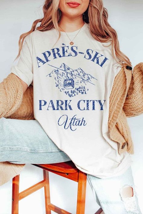 APRES SKI PARK CITY UTAH GRAPHIC T-SHIRTPREMIUM COTTONUNISEX SIZINGCLASSIC FITMade In: USAFabric Contents: 100% Cotton Apres Ski Graphic, Ski Graphic, Ski Park, Ski Design, Graphic Tee Women, Ski Aesthetic, Holiday Graphics, Park City Utah, Drop Shoulder Sweaters