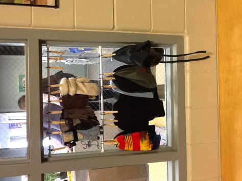 This is how we show hats and mittens for the Lost & Found at school. Spring loaded curtain rod. Drill holes in the clothespins and hook to the rod via a zip tie. Add more or less. Easily seen by all who walk past the office on the way to lunch. Far fewer stray items than when we just had them in a bunch by the coat rack. Lost And Found School Ideas, School Lost And Found Organization, School Lost And Found Ideas, Lost And Found Ideas For School, School Council, School Donations, Donation Ideas, Prek Ideas, Abc School