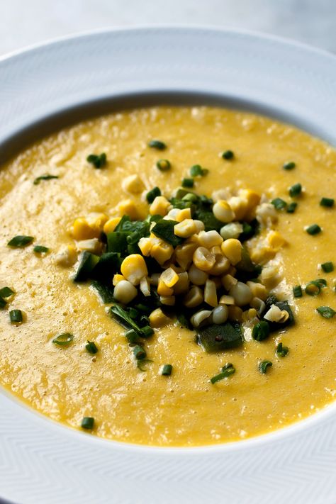 NYT Cooking: This is another creamy corn dish that has no cream in it – in fact, it has no dairy at all. I simmer the corn cobs to make the stock. When the corn is sweet, so is the soup, and I love the contrast of the sweet, creamy potage against the spicy roasted peppers. Poblano Soup Recipe, Poblano Chowder, Corn And Poblano, Corn Poblano, Soup Summer, Nyt Recipes, Cooking Corn, Succotash Recipe, Corn Succotash