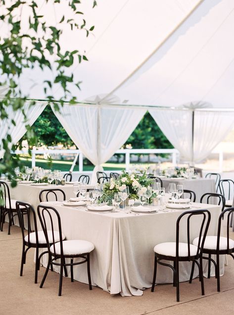 This all white with green table decor was gorgeous at the reception. With clear glasses and candles it gives a very upscale look. #Wedding #TableDecor #AllWhite #Green #Reception |  Martha Stewart Weddings - This Upscale California Garden Party Is Proof That a Classic Wedding Can Feel Personal Rectangular Wedding Table Decor, Square Table Centerpiece, Square Wedding Tables, California Desert Wedding, Pastel Invitation, Reception Table Centerpieces, Joshua Tree Wedding, Bow Wedding Dress, California Garden