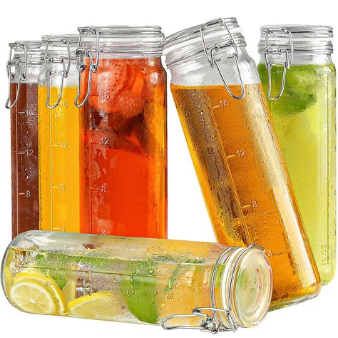 PRICES MAY VARY. ·[PREMIUM GLASS & AIRTIGHT LIDS] - These glass juice bottles bottles are made of food-grade glass, Healthy, tasteless, and 100% BPA-free. Glass water bottles is sealed with a high-quality food-grade rubber gasket cover and a stainless steel locking clip design to ensure that your food is sealed and never get bad, keeping fresh and does not overflow the water. So it will never leave a leaky mess in your car or bag, no matter how you place the bottle. ·[VANILLA EXTRACT & BEVERAGE] Juice Jar, Glass Drinking Bottles, Glass Kitchen Canisters, Wide Mouth Mason Jars, Glass Hinges, Pickle Jars, Glass Jars With Lids, Ice Tea, Glass Food Storage