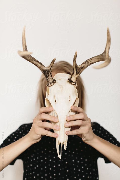 person holding deer skull in front of face with both hands by Nicole Mason for Stocksy United Holding Skull, Dystopia Rising, Skull Reference, Deer Skull, Deer Skulls, High Art, People Photography, Skull Art, Face Art