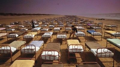 700 wrought iron beds on the beach for PF's Momentary Lapse of Reason Pink Floyd Cover, Pink Floyd Album Covers, Storm Thorgerson, Pink Floyd Music, Atom Heart Mother, Pink Floyd Albums, Pink Floyd Art, Richard Williams, Bon Scott