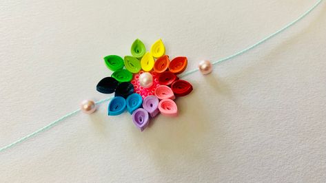 Creative Rakhi Making Ideas, Rakhi Decoration Ideas, Homemade Rakhi Ideas, Home Made Rakhi Ideas, Paper Rakhi Making For Kids, Rakhi Decoration, Rakhi Quilling Design, Quilling Rakhi Handmade, Making Rakhi At Home