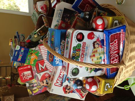 Mario Brothers Theme Mario Themed Gift Basket, School Auction Basket Themes, Theme Basket Ideas, Basket Bingo Baskets, Disney Themed Basket, Class Auction Basket Themes, Theme Baskets, Auction Baskets, Raffle Baskets