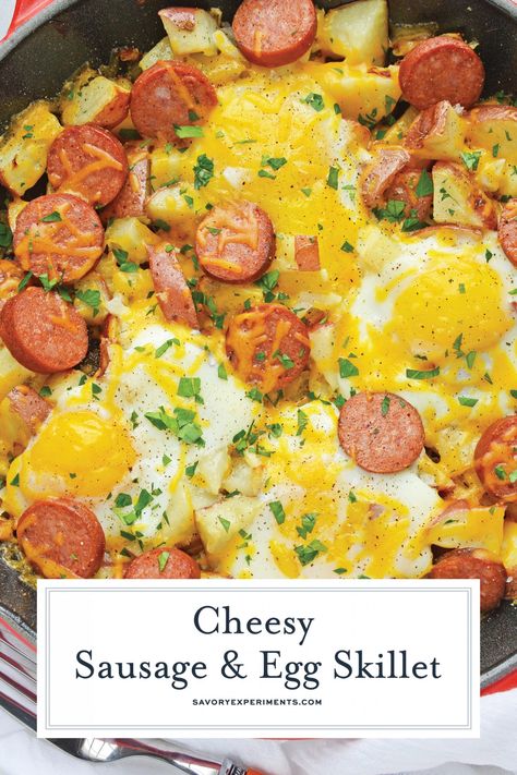 Sausage and Egg Skillet is a delicious breakfast skillet with andouille sausage, potato, eggs and gooey cheese. Ready in 30 minutes and perfect for special weekend brunch! #breakfastskilletrecipe #castironskilletrecipes www.savoryexperiments.com via @savorycooking Breakfast Sausage And Potatoes, Easy Breakfast Skillet Recipes, Sausage Breakfast Skillet, Easy Breakfast Skillet, Potato Eggs, Potato And Egg Breakfast, Andouille Sausage Recipes, Sausage Egg Casserole, Breakfast Skillet Recipes