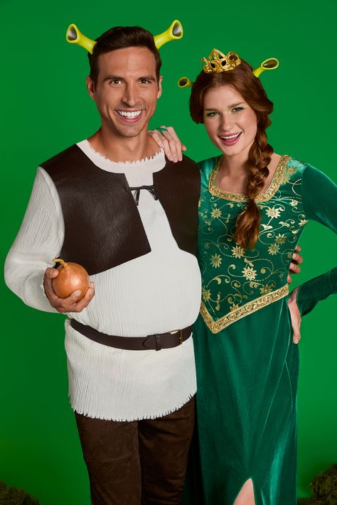 Shop Spirit for official Shrek costumes and accessories! If you’re looking for costumes from Shrek such as Fiona and Shrek himself, we have exactly the looks you want. From Shrek ears to make your Shrek costume totally authentic, to the perfect Shrek makeup, we have it all. Go as a couple in matching Shrek and Fiona costumes for a look that’ll have everyone doing double takes. Shrek And Fiona Costume Couple, Shrek X Fiona, Fantasia Shrek E Fiona, Fiona From Shrek Costume, Diy Shrek Ears, Shrek Couple Costume, Shrek Family Costume, Diy Shrek Costume, Shrek Costume Diy