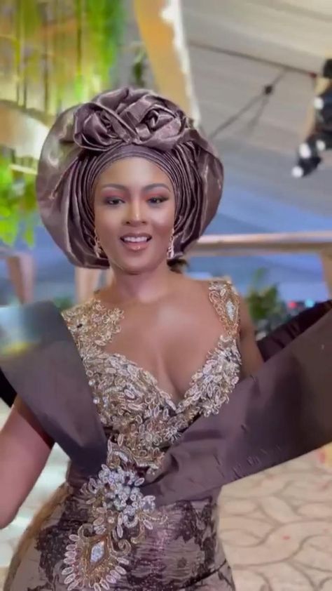 African Lace Styles Traditional Weddings Purple, Black Gele Aso Ebi, Asoke Gele Styles For Asoebi, Coffee Brown Lace Asoebi Styles, Brown Asoebi Lace Styles, Gold Lace Styles, Nigerian Wedding Dresses Traditional Yoruba, Brown Asoebi Styles, Brown Asoebi