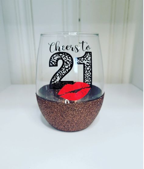 Cheers to 21 Wine Glass- Birthday Wine Glass- Twenty One- 21st birthday-Glitter Dipped Wine Glass- Wine Tumbler- Personalized Birthday Gift This 21oz. glitter stemless wine glass is the perfect birthday gift for any wine lover! They will be celebrating their birthday with a wine glass that will soon be their favorite! This stemless wine glass can be dipped in your choice of glitter or you can keep it simple with just a plain glass. Glitter color pictures is Bronze. 21st Birthday Wine Glass Ideas Diy, 21 Birthday Wine Glass, Cheers To, Birthday Glitter, Birthday Wine Glass, Custom Wine Glasses, Birthday Wine, Glitter Dipped, Tumbler Personalized