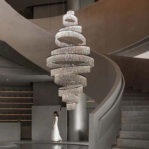 If you are looking for a luxurious and impressive statement piece, look no further. This eye-catching chandelier is perfect for anyone who wants to make a bold statement with their décor. With its intricate design and dazzling crystals, this chandelier is sure to impress. Whether you are looking to add some glamor to your hallway or want to make a dramatic impact in your foyer, this chandelier is a perfect choice. Warranty: 2 years Voltage: 90-260V Switch Type: Remote Control Style: Modern Shade Bottles Chandelier, Extra Large Living Room, Living Room Staircase, Entry Chandelier, High Ceiling Lighting, Crystal Chandelier Living Room, Diy Lights, Luxury Staircase, Led Crystal Chandelier