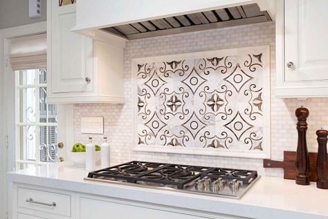 Decorative Black and White Kitchen Stove Backsplash Panel Over White Tile | HGTV Cooktop Backsplash, Range Backsplash, Kitchen Backsplash Panels, Creative Kitchen Backsplash, Kitchen Decor Tiles, Mosaic Tile Backsplash Kitchen, Brick Backsplash Kitchen, Mosaic Tile Kitchen, Decorative Backsplash