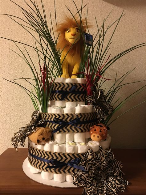 Lion King diaper cake Safari Diaper Cake Boy, Lion King Diaper Cake, Diaper Decorations, Cake Lion, Diaper Animals, Onesie Cake, Safari Baby Shower Boy, Rodjendanske Torte, Lion Baby Shower