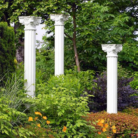 Give your landscape a lift by adding high points -- in this case, three 12-foot-tall classically inspired concrete columns that stand like exclamation points. #gardening #bhg Garden Pillars Columns Landscaping, Diy Outdoor Pillars Columns, Concrete Pillars Ideas, Garden Pillars Ideas, Garden Columns Ideas, Roman Garden Ideas, Concrete Pillars Columns, Garden Columns, Garden Pillar