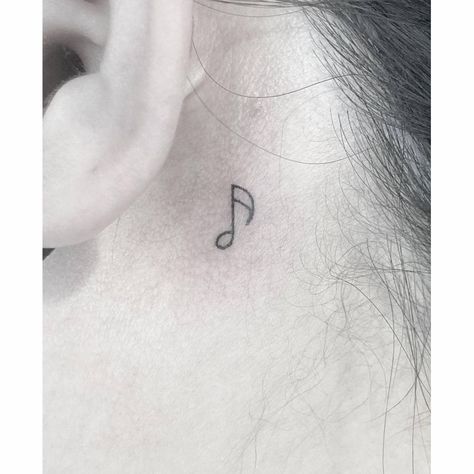 Minimlaistic quaver tattoo done behind the ear. Tatoos Behind The Ear Cute, Minimalist Ear Tattoo, Music Behind Ear Tattoo, Minimal Tattoo Music, Small Music Note Tattoo, Music Tattoo Behind Ear, Music Ear Tattoo, Music Tattoo Designs Behind Ear, Behind Ear Tattoo Music