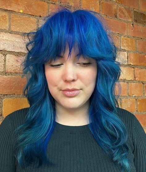 Rockabilly Blue shag cut >>> 💙✨ @hair_by_ewelina_xox 🎨 #manicpanic #manicpanicprofessional #hair #haircare #hairstylist #hairinspo #healthyhair #hairstyles #hairsalon #crueltyfreebeauty #haircolor #veganhair #crueltyfreehairdye #saloninternational #saloncolour @creativeheadmag @prohairmag @hairdressersjournal @sallybeautyuk @salonservicesuk @astonandfincher @salonsdirect @adelprohairbeauty @salon_int Blue Shaggy Hair, Blue Shag Hair, Rockabilly Blue Manic Panic, Blue Hair Mullet, Ice Blue Hair, 70s Haircuts, Emo Hairstyles, Shag Cut, Haircut Inspo