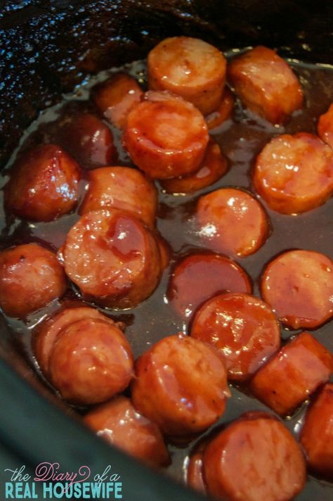 Slow Cooker Sweet Kielbasa. So simple to make in your slow cooker and makes the perfect game day food or simple dinner idea. Sweet And Sour Kielbasa, Kielbasa Crockpot, Kabasa Recipes, Slow Cooker Kielbasa, Crockpot Appetizers, Kielbasa Recipes, Sausage Dishes, Simple Dinner, Appetizer Bites