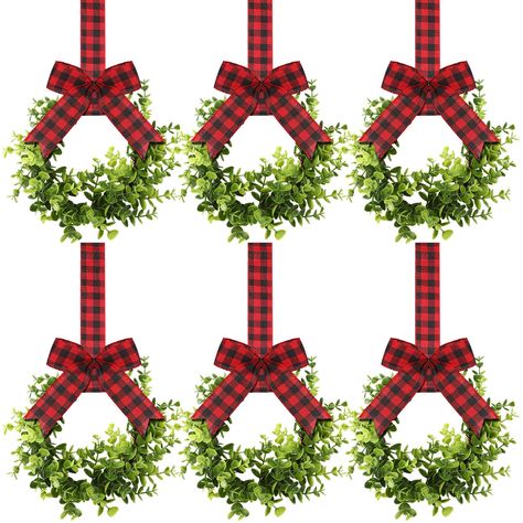 PRICES MAY VARY. Satisfy Your Decoration Needs: the package comes with 6 pieces of artificial kitchen cabinet wreaths, which are enough to fully meet your various decorative needs in Christmas and daily file, and you can share them with others Reliable Material: the kitchen cabinet decor is mainly made of plastic, rattan and fabric materials, which is not easy to fade or deform, reliable and firm, does not need maintenance, and can be applied for a long time Size Information: the farmhouse wreat Modern Christmas Living Room Decor, Garland On Top Of Cabinets, Chandler Christmas Decor, Green Themed Christmas Decor, Kitchen Decor Christmas Ideas, Christmas Decor For Porch Columns, Christmas Decorations Kitchen Cabinets, Country Kitchen Christmas Decor, Holiday Decor Kitchen