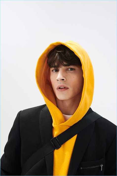 Embracing a pop of color, Adrien Sahores models a yellow hoodie by Reserved. Adrien Sahores, Hoodie Outfit Men, Yellow Photography, Avan Jogia, Yellow Clothes, Estilo Indie, Portrait Photography Men, Mens Fashion Photography, Yellow Hoodie