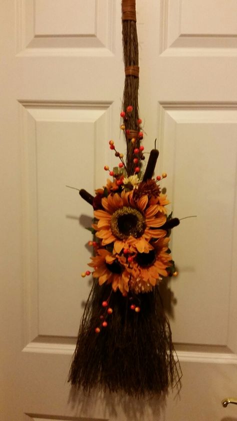 Cinnamon Broom Decorated For Fall Sunflowers Fall Broomstick Decor, Broom Crafts Ideas, Decorated Witches Broom, Fall Broom Decoration, Cinnamon Broomstick Decor, Decorated Broomsticks, Decorating Cinnamon Brooms, Cinnamon Broom Ideas, Cinnamon Broom Decor