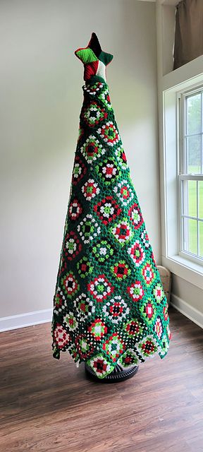 Ravelry: Granny Square Christmas Tree pattern by Patricia Wilson Crochet Christmas Village Free Pattern, Christmas Granny Square Crochet, Granny Square Christmas Tree, Granny Square Christmas, Unusual Christmas Trees, Granny Christmas, Christmas Tree Festival, Knitted Christmas Decorations, Crochet Christmas Trees Pattern