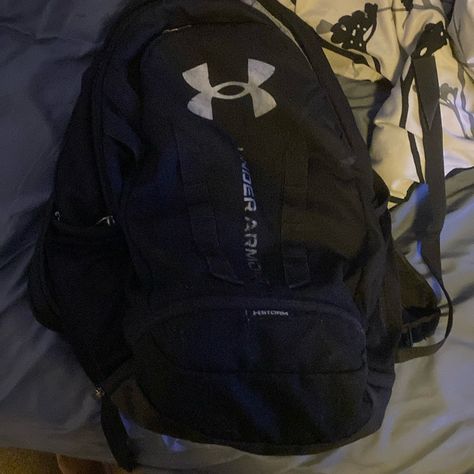 A Black Under Armor Book Bag Under Armour Backpack Aesthetic, Under Armour Backpack, Gym Sack, Grey Backpacks, Cute Skirt Outfits, Training Bags, Unisex Backpack, Backpack Sport, Blue Backpack