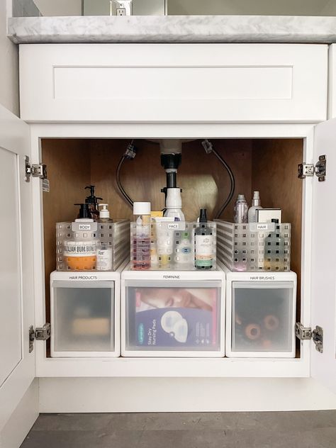 Simply Done: Organizing Under a Bathroom Sink Small Bathroom Sink Organization, Organization Under Bathroom Sink, Organize Under Bathroom Sink, Bathroom Counter Organization Ideas, Bathroom Countertop Organization, Organization Ideas Bathroom, Bathroom Under Sink Organization, Under Bathroom Sink, Bathroom Organization Ideas