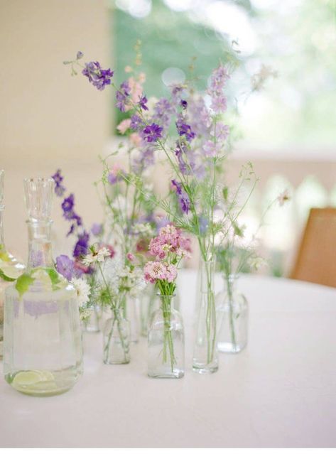 White Florals With Pops Of Color, Dainty Floral Centerpieces, Lavender Wildflower Wedding, Wedding Florals Purple, Dainty Wedding Flowers, Wedding Flowers Light Purple, Lilac Flowers Centerpieces, Lilac Flower Arrangements, Purple Flower Centerpieces Simple